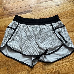 Size 8 Lululemon Black and White/Grey patterned athletic shorts